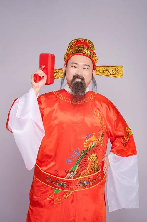 财神爷拿枪图片
