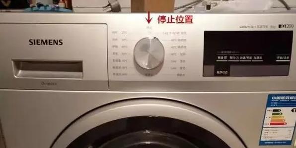 滚筒洗衣机烘干中途断电门打不开