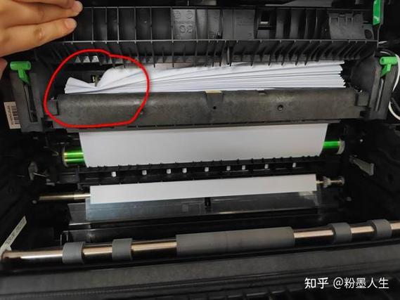 打印机打2张纸就卡纸