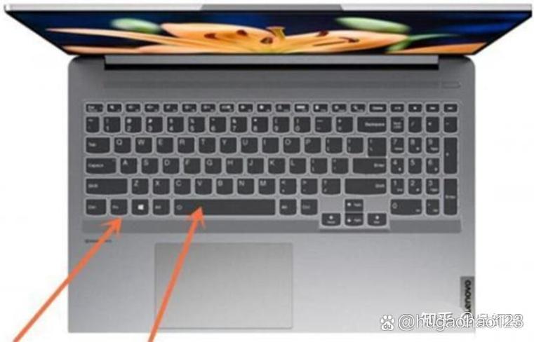 联想小新怎么打开键盘灯