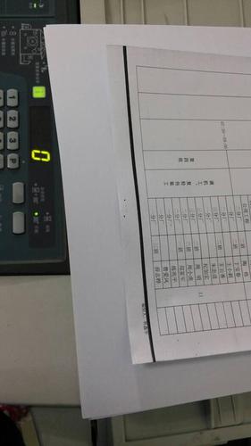 复印机复印出现黑粗条