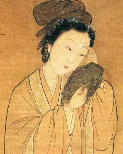 对镜贴花黄,向北思