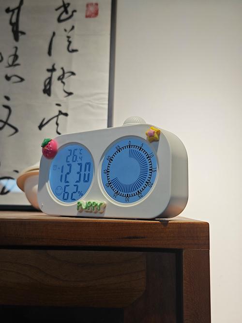 桌面上的时间怎么调整位置