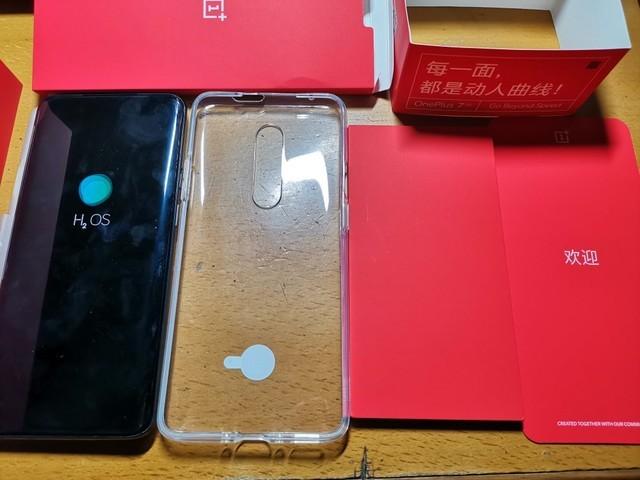 一加7pro屏幕底有浅红色加号截图