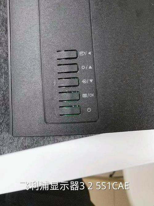 飞利浦电视确认键在哪