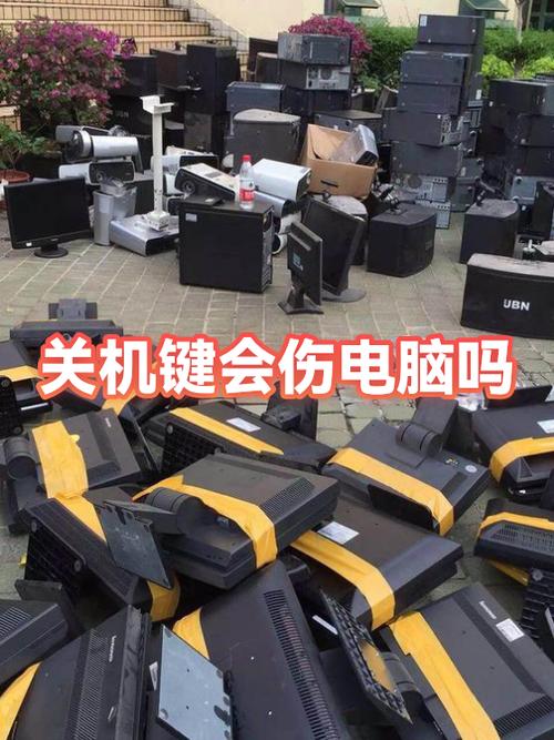 直接按关机键伤电脑吗