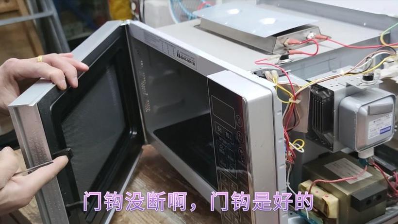 微波炉门打不开