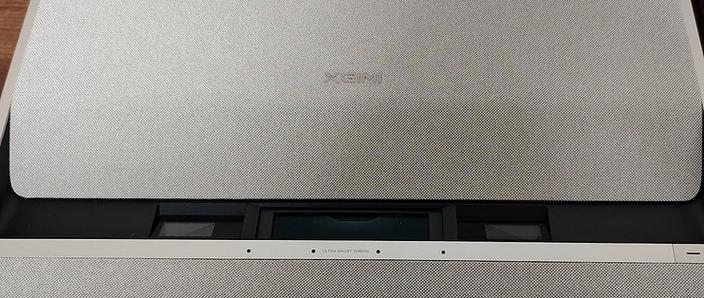 极米m1遥控器后盖怎么打开图解