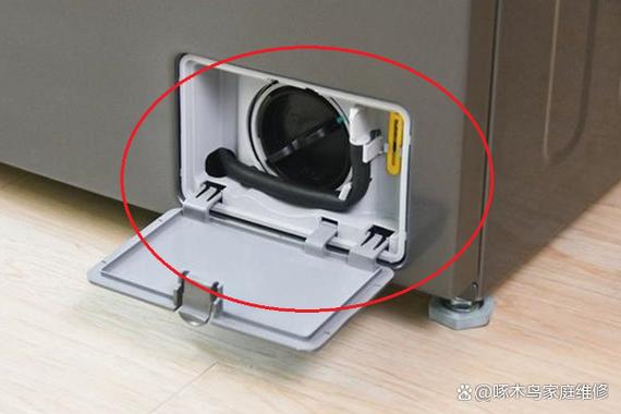 美的滚筒洗衣机污垢盒取出图解