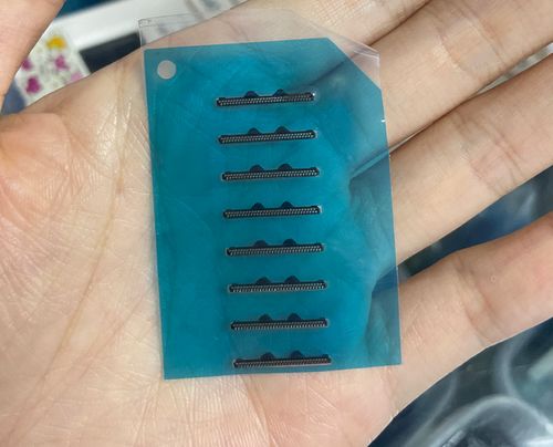 不小心把听筒防尘网弄坏了