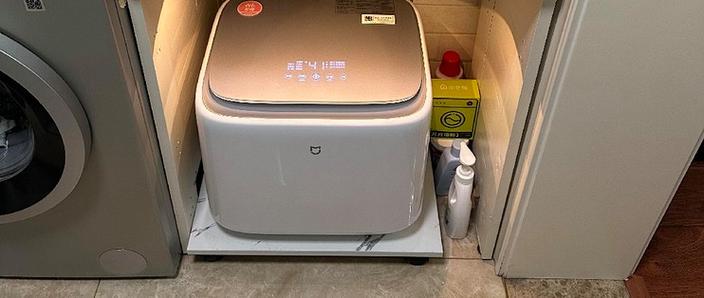 小米洗衣机排水泵过滤盖在哪里