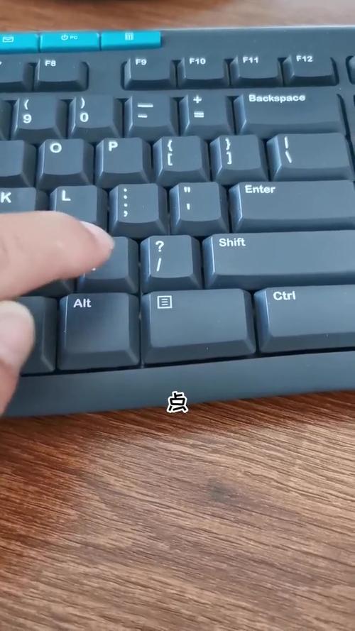 电脑键盘的省略号怎么打