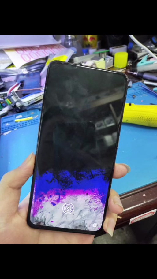 手机屏幕出现紫块怎么处理