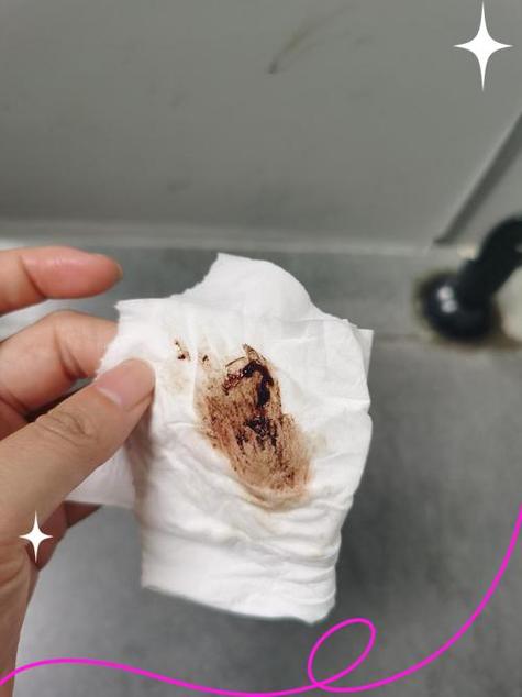 月经下不来但是用纸擦有血褐色的