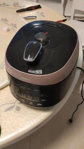 美的电高压锅拆盖教程