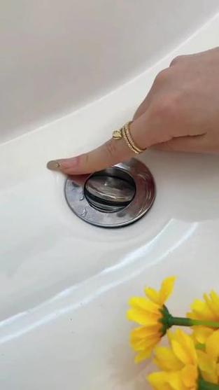 面盆的下水塞子怎么去掉更换