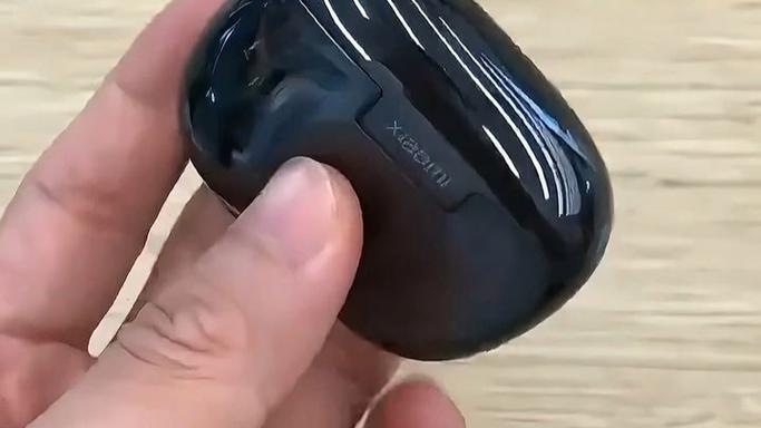 小米蓝牙耳机盖上盖子还连手机