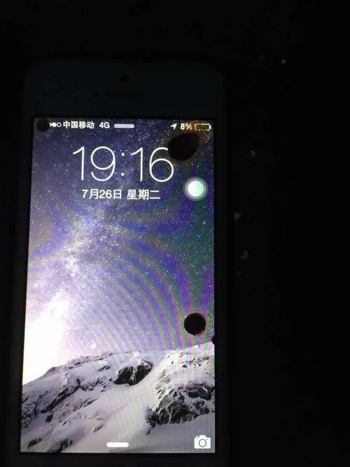 苹果手机突然有个黑色的圆圈