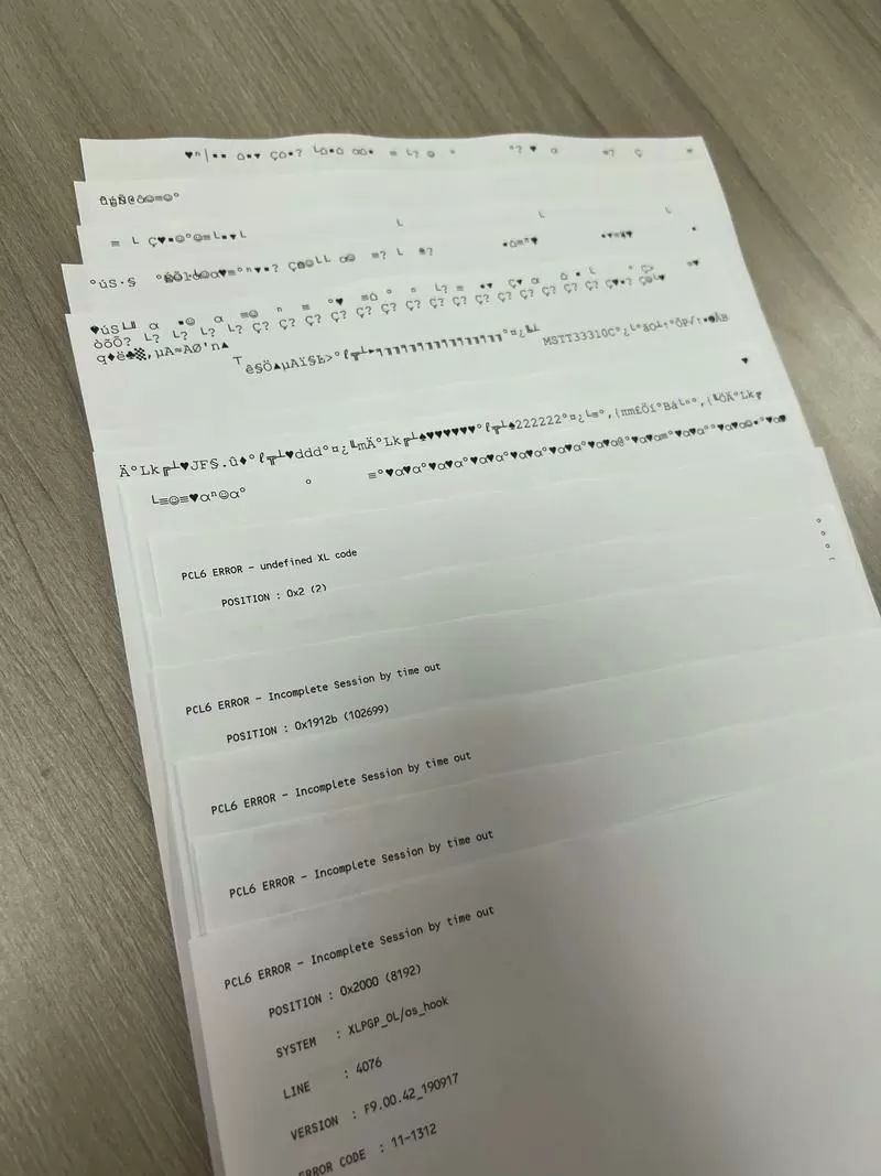 惠普打印机一直乱码自动打印