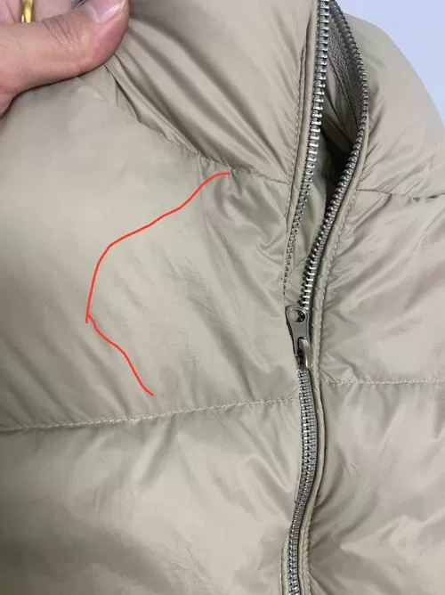 新羽绒服沾水有印子